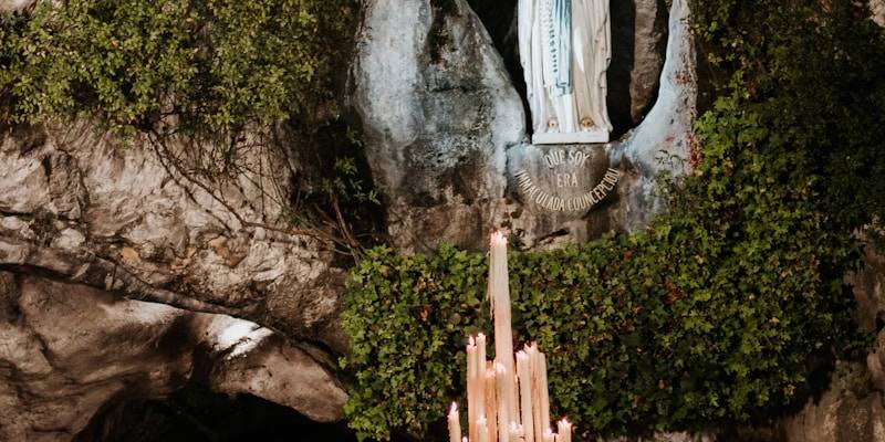 white angel statue on brown rock